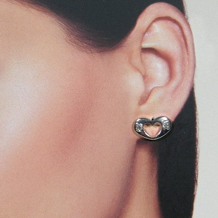Zilveren hartjes oorknopje met strass steentjes