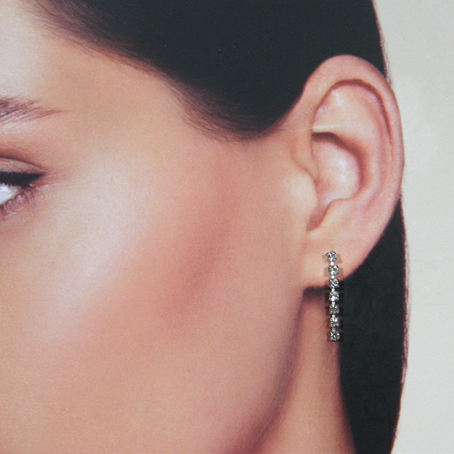 Lange oorhanger met strass steentjes