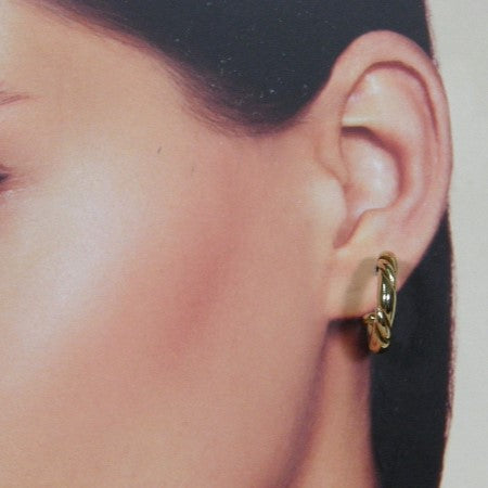 Gouden Franse creool oorsteker gedraaid