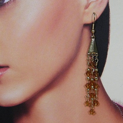 Lange oorhanger met 3rij Topaas Swarovski kristallen