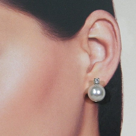 Parel oorsteker met kristallen kroontje