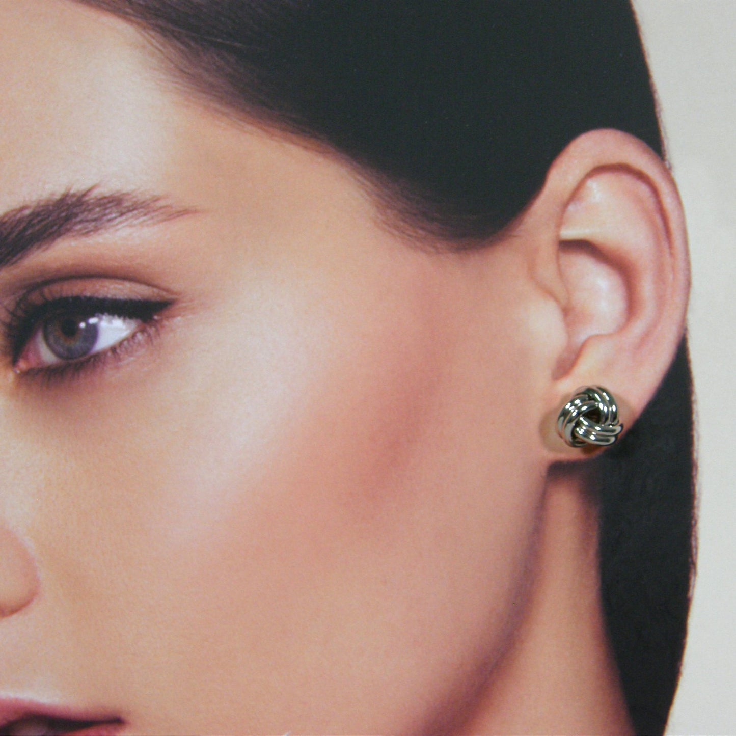 Zilveren gevlochten knoop oorknop