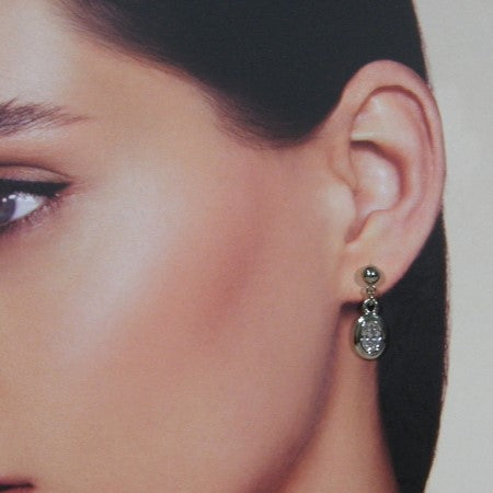 Zilveren oorhanger met ovale zirconia steentjes