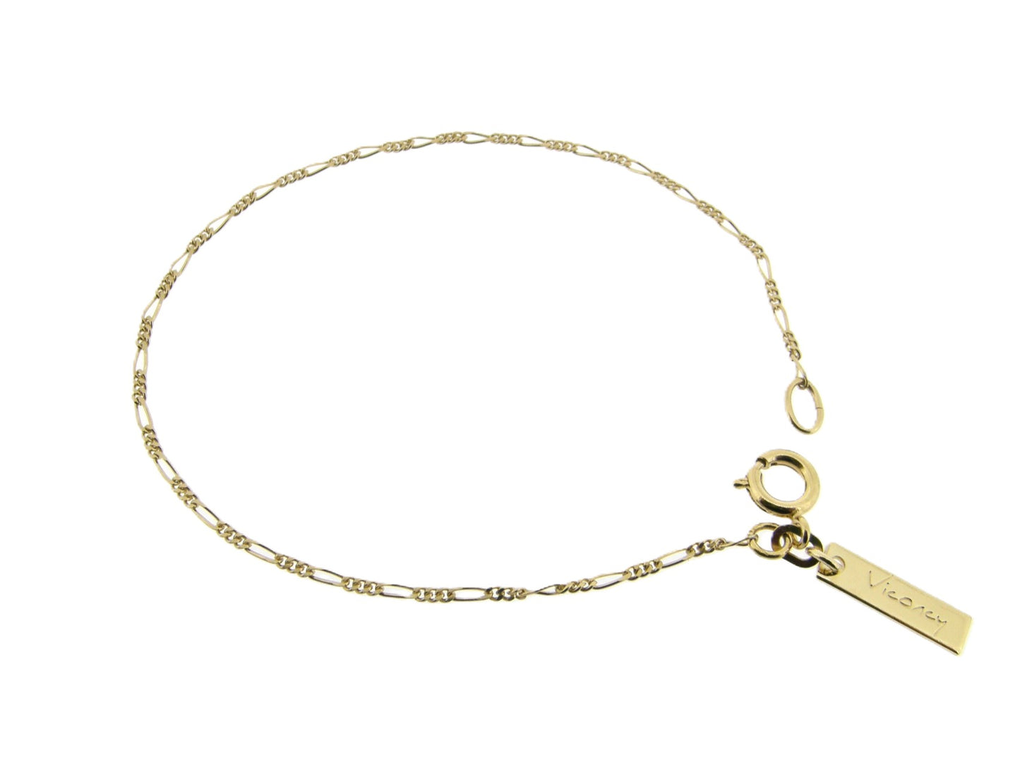 Gouden armbandje met figaro schakeltjes aan beiden zijden vlak geslepen