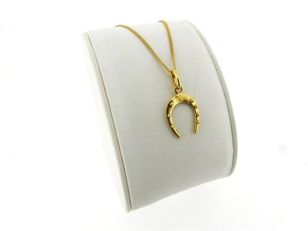 Gouden ketting met hangertje geluk hoefijzer