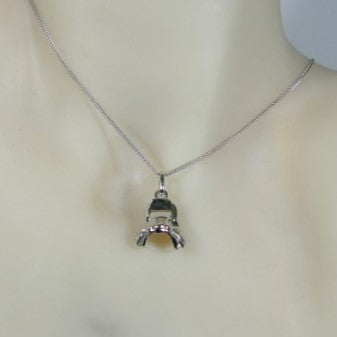 Zilveren dunne gourmet ketting met Jockey zadel hangertje