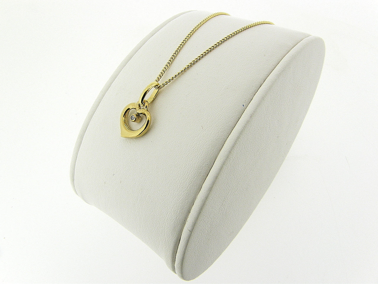 Gouden ketting met hangertje hartje en zirconia steentje